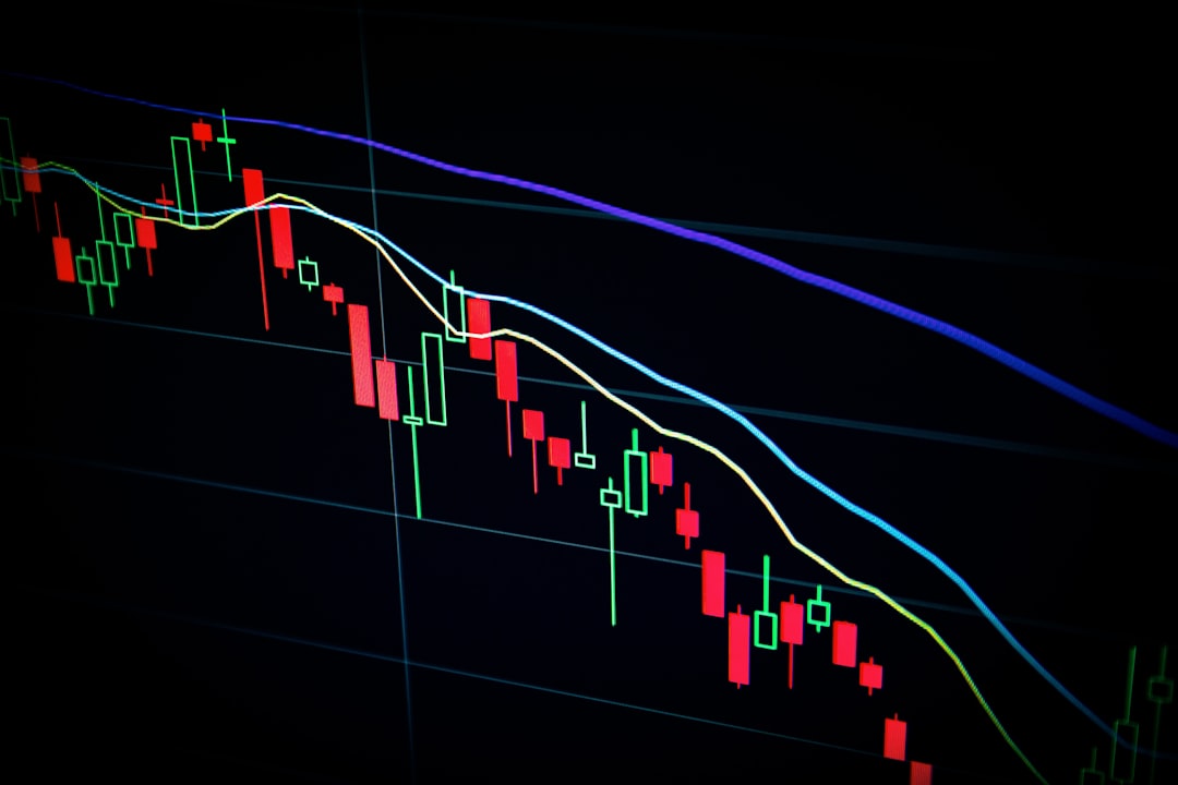 kalshi vs sportsbook odds - stock market candlestick chart on dark screen