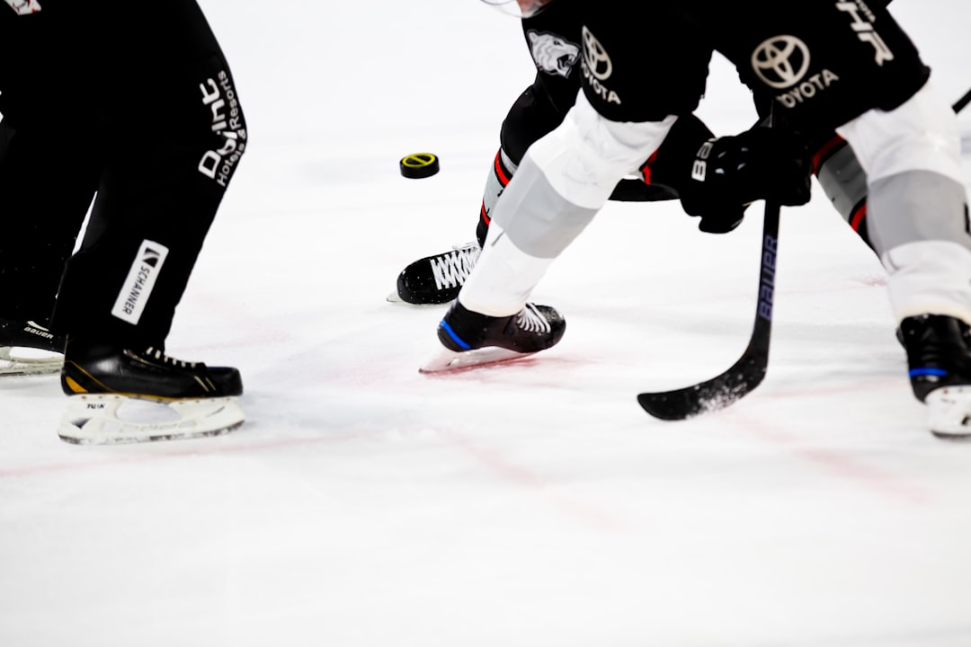 puck line explained - people playing ice hockey